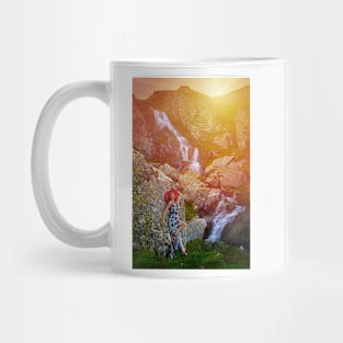 Woman by waterfall at sunset Mug